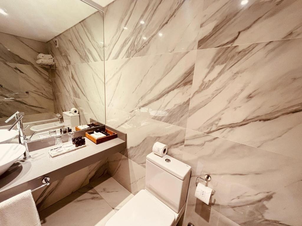 AQ Tailored Suites — 2